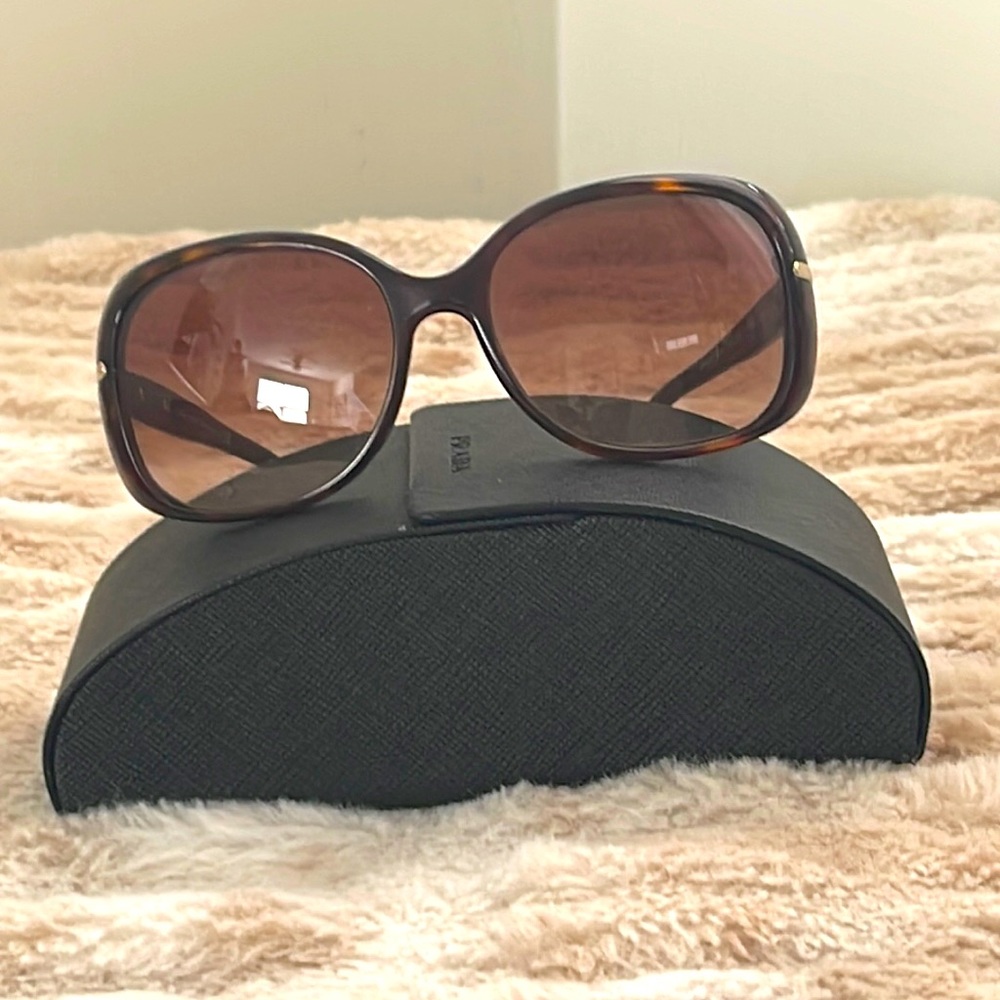 New without tags Prada sunglasses!